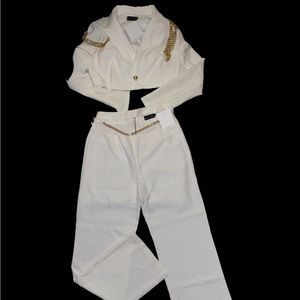Polyester Pant Suit w/ detail on top arms.